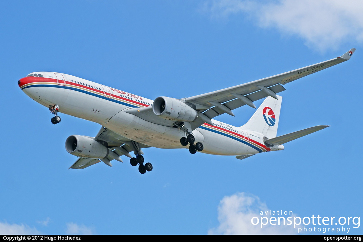 B-6082 - China Eastern Airlines Airbus A330-243 at Vancouver International Airport (YVR/CYVR) taken by Hugo Hochedez | openspotter.org | ID: 11735