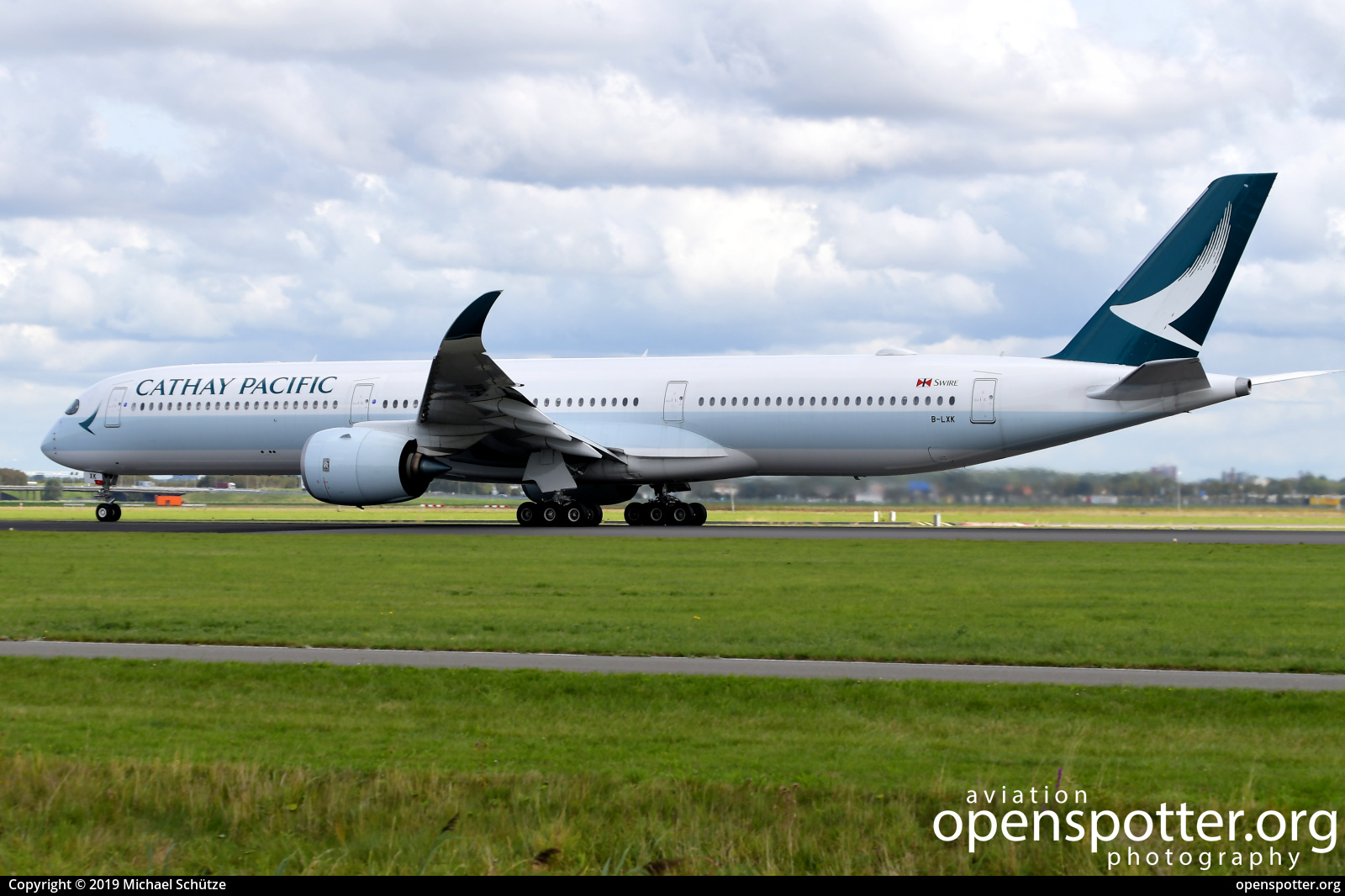 B-LXK - Cathay Pacific Airbus A350-1041 at Schiphol Airport (AMS/EHAM) taken by Michael Schütze | openspotter.org | ID: 64866