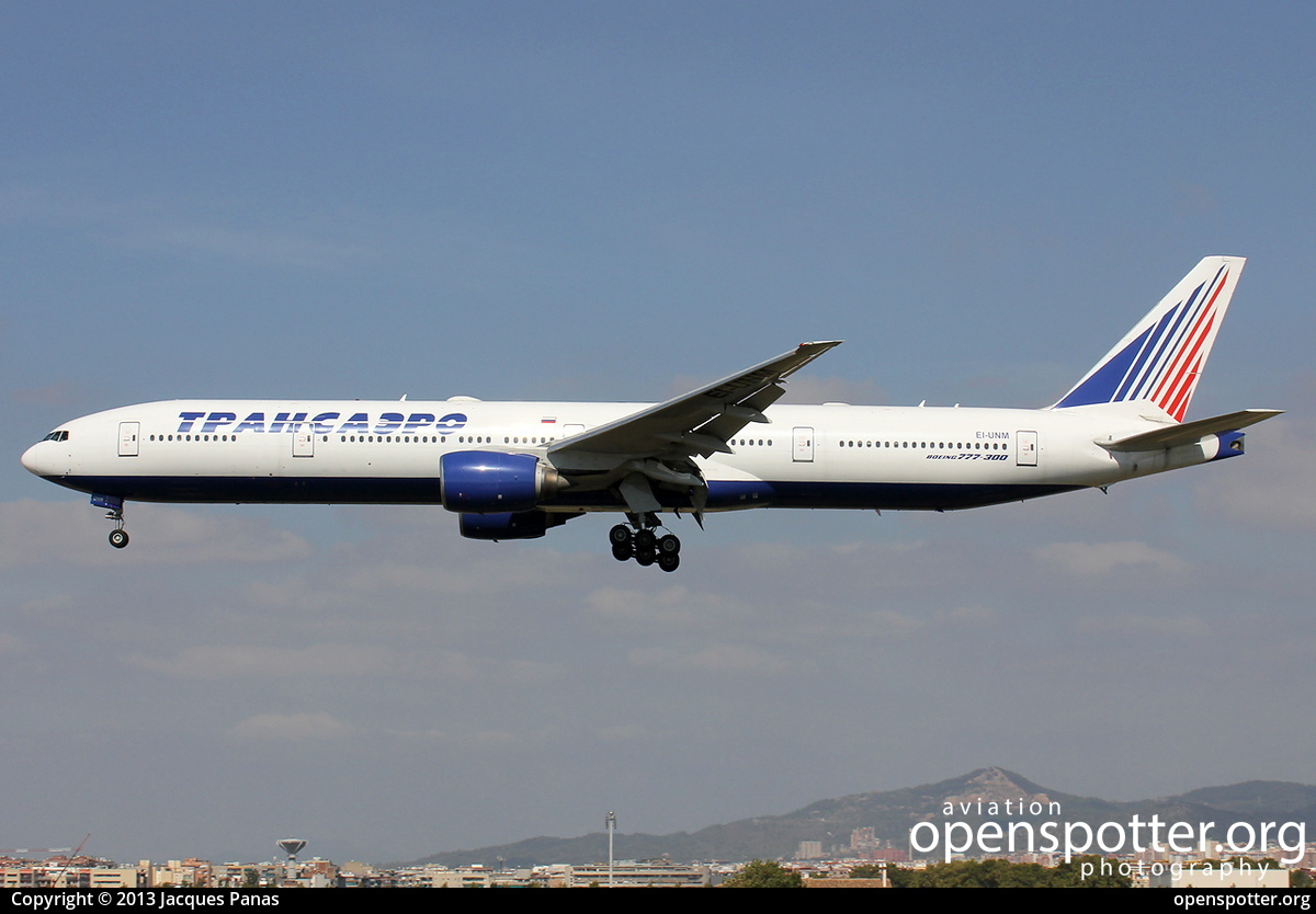 EI-UNM - Transaero Airlines Boeing 777-312 at Barcelona Airport (BCN/LEBL) taken by Jacques Panas | openspotter.org | ID: 26260